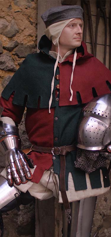 Red and green Mi Parti medieval clothing.