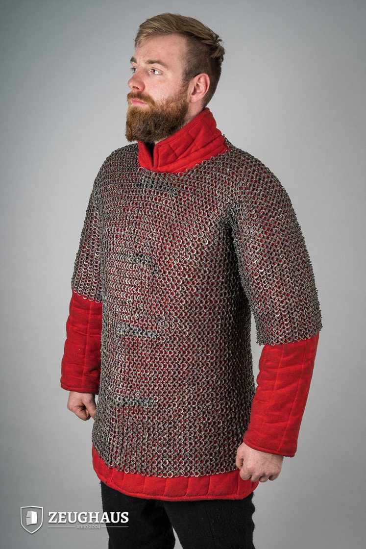 Camiseta de malla plana con anillos remachados de titanio de 9 mm.